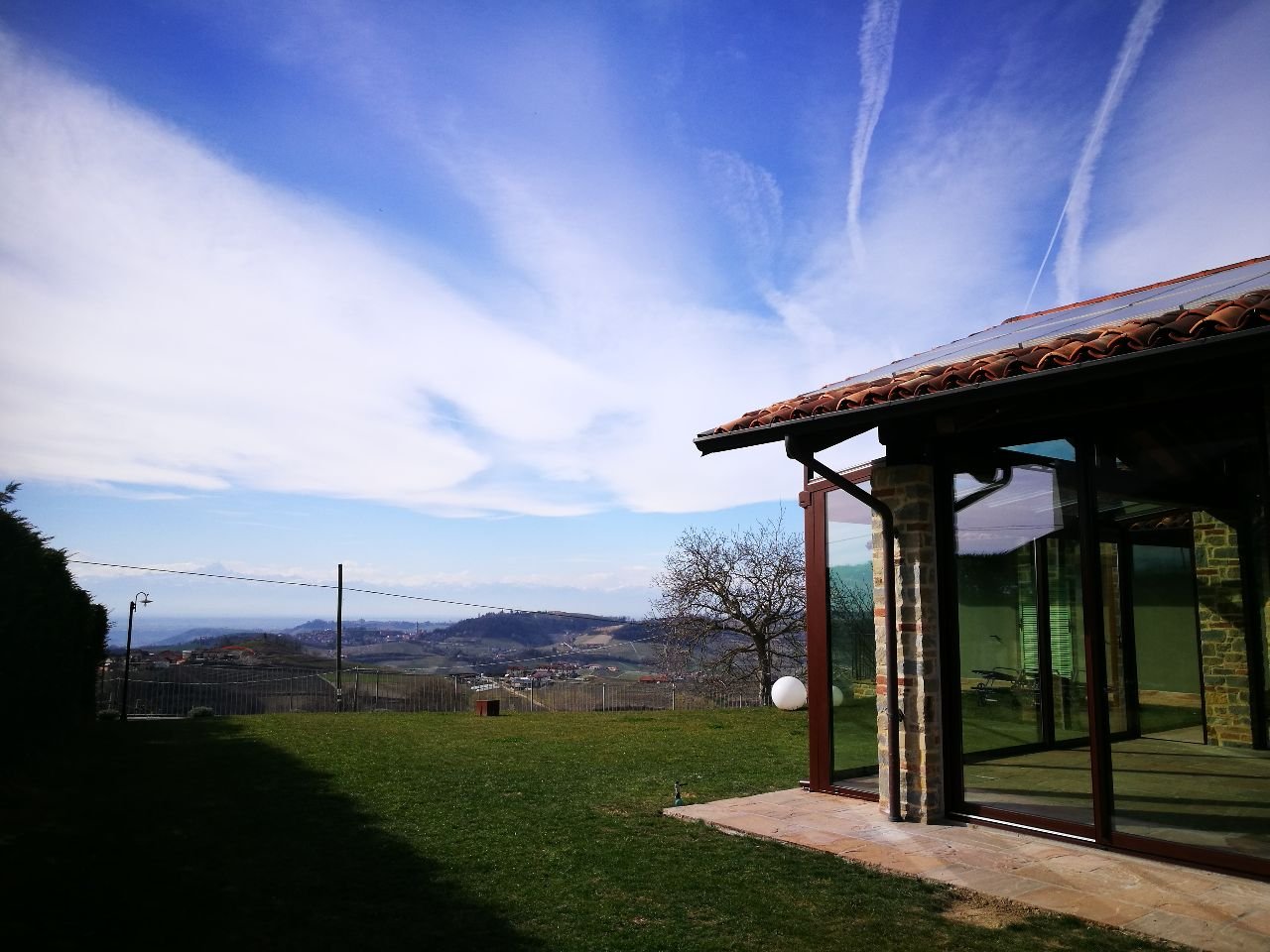 Serra solare e tende verticali